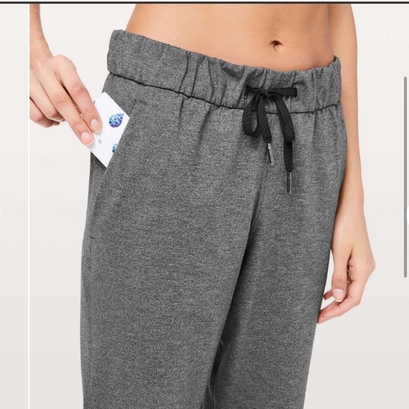 12. Lululemon On The Fly Pant *27" Heathered Black - Picture 4 of 16
